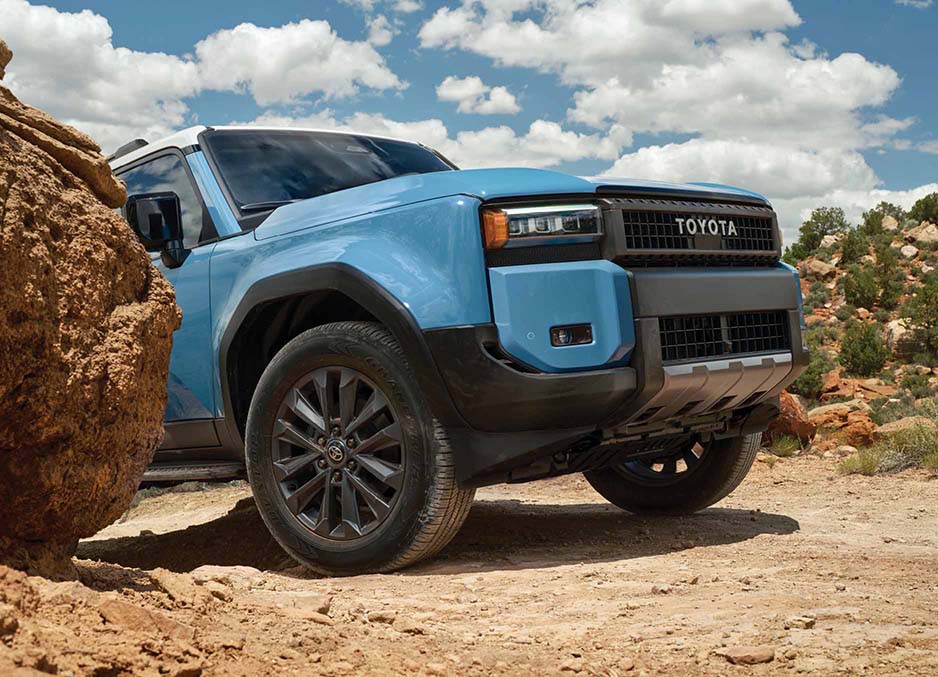 Land Cruiser climbing a mountain