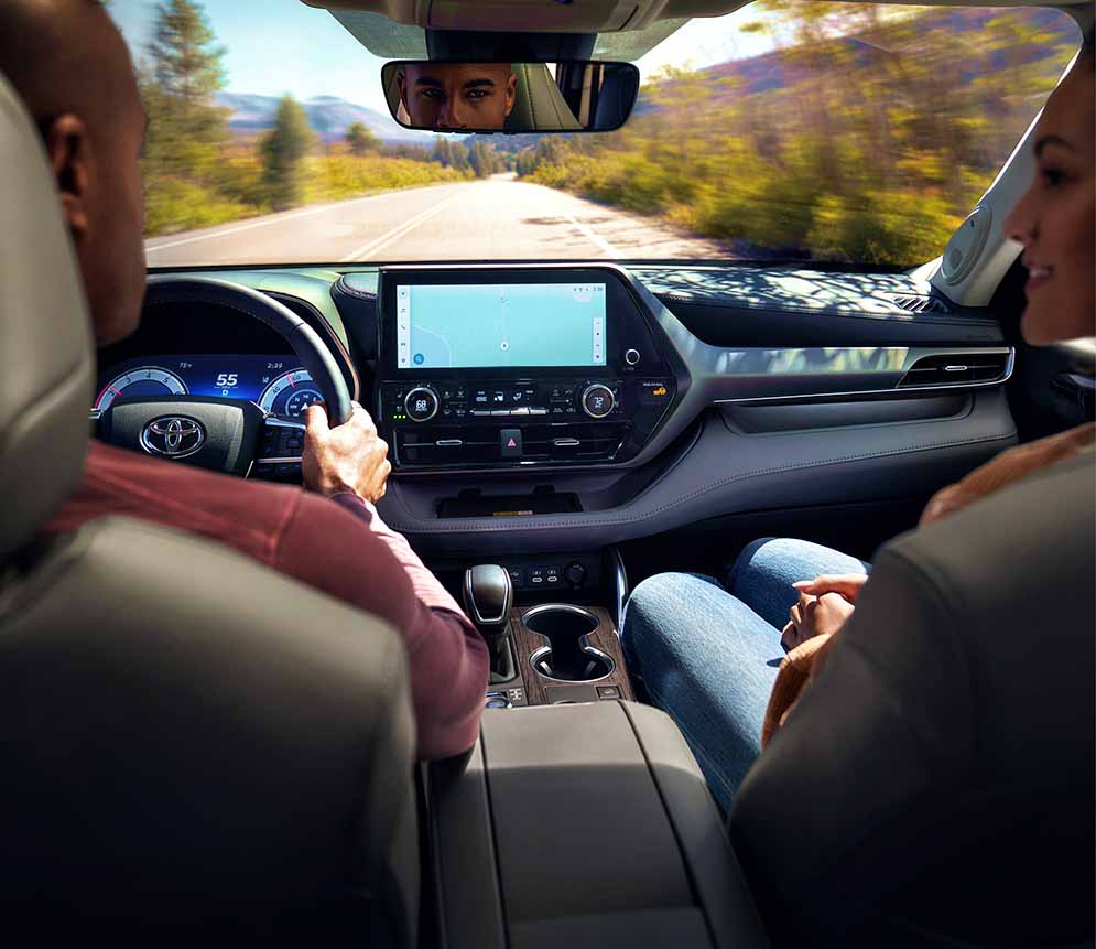 Couple driving down the road safely