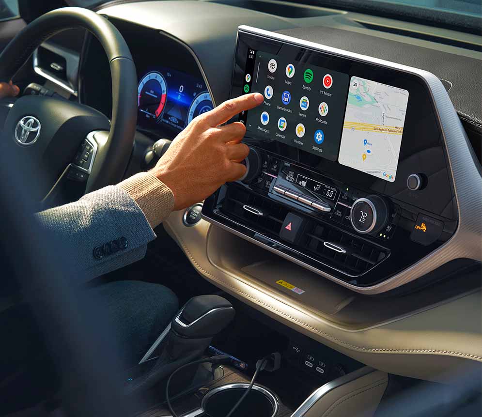 Interior infotainment center with large screen showing apps available