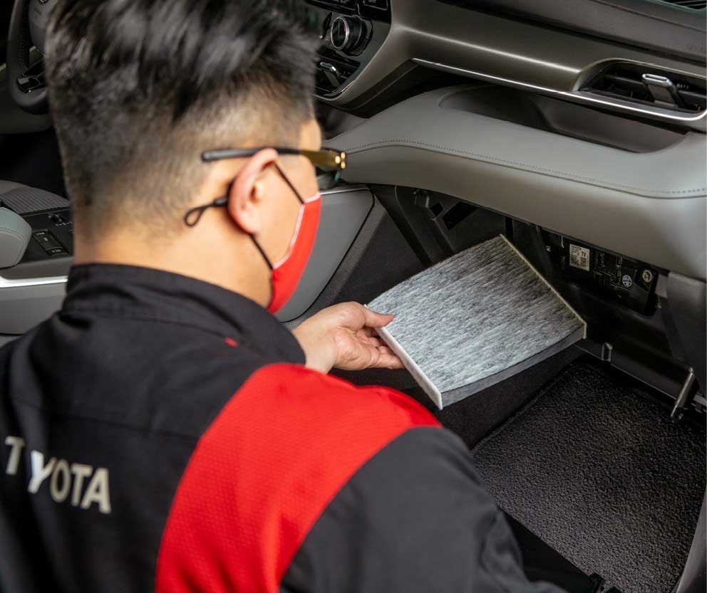 Certified Auto Technician Replacing Cabin Filters