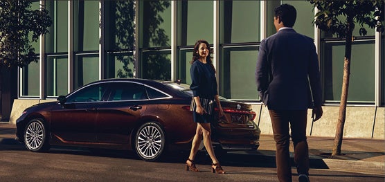 Couple enjoying the scenery in their hybrid electric vehicle